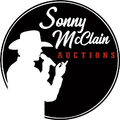 A black and white photo of the sonny mcclain auctions logo.